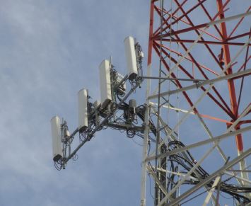 5G Cellular tower showing typical RRH installation behind antennas